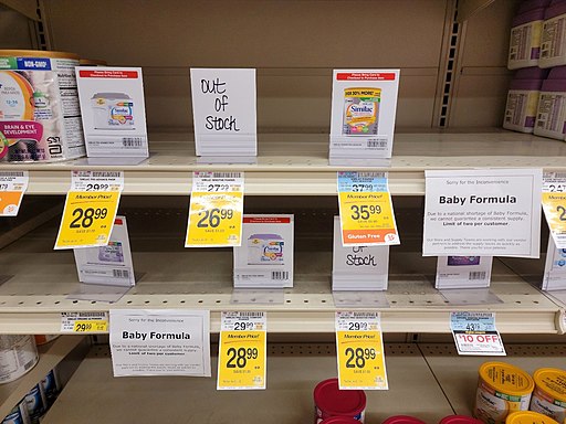 Image of empty shelves that should be stocked with baby formula