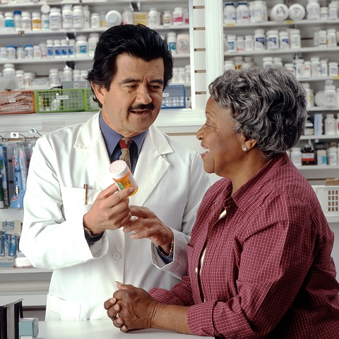 Patient  talks to her pharmacist about her medication.
