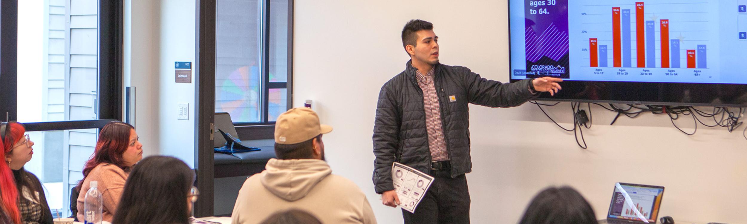CHI's Gerardo Silva-Padron presenting data to a community group