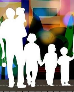 white silhoutettes of a family in front of a colorful urban background